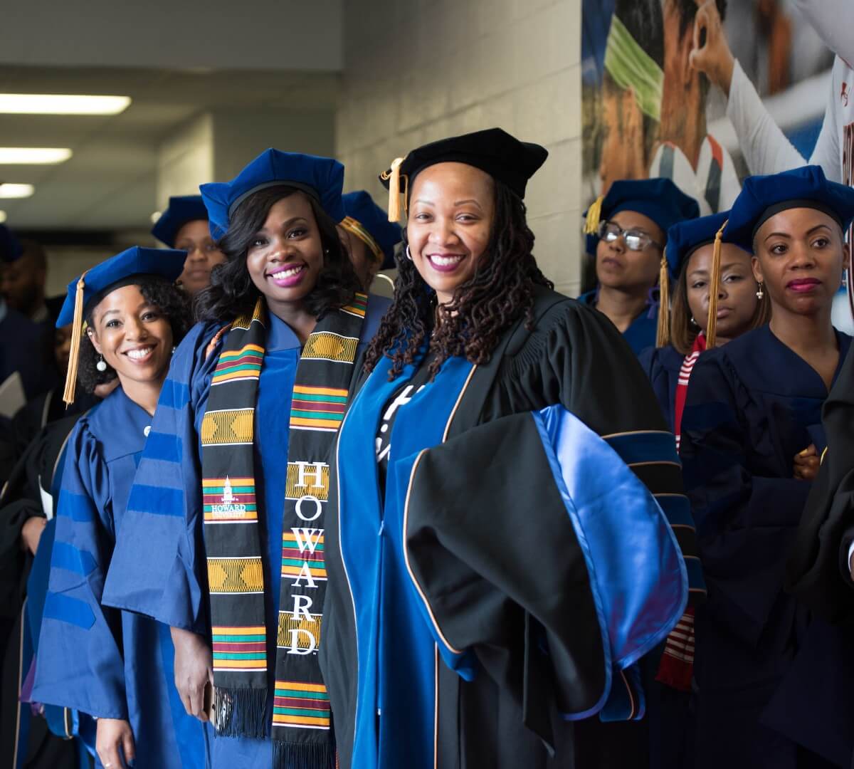 Graduate School students in regalia at Hooding Ceremony